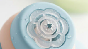 Close up of a leak proof silicone valve on an infant feeding cup designed for safety and steady flow
